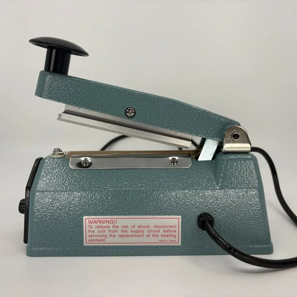 Uline H-458 4 Inch Impulse Sealer 120V 160W Plastic Bag Heat Sealer Powers on